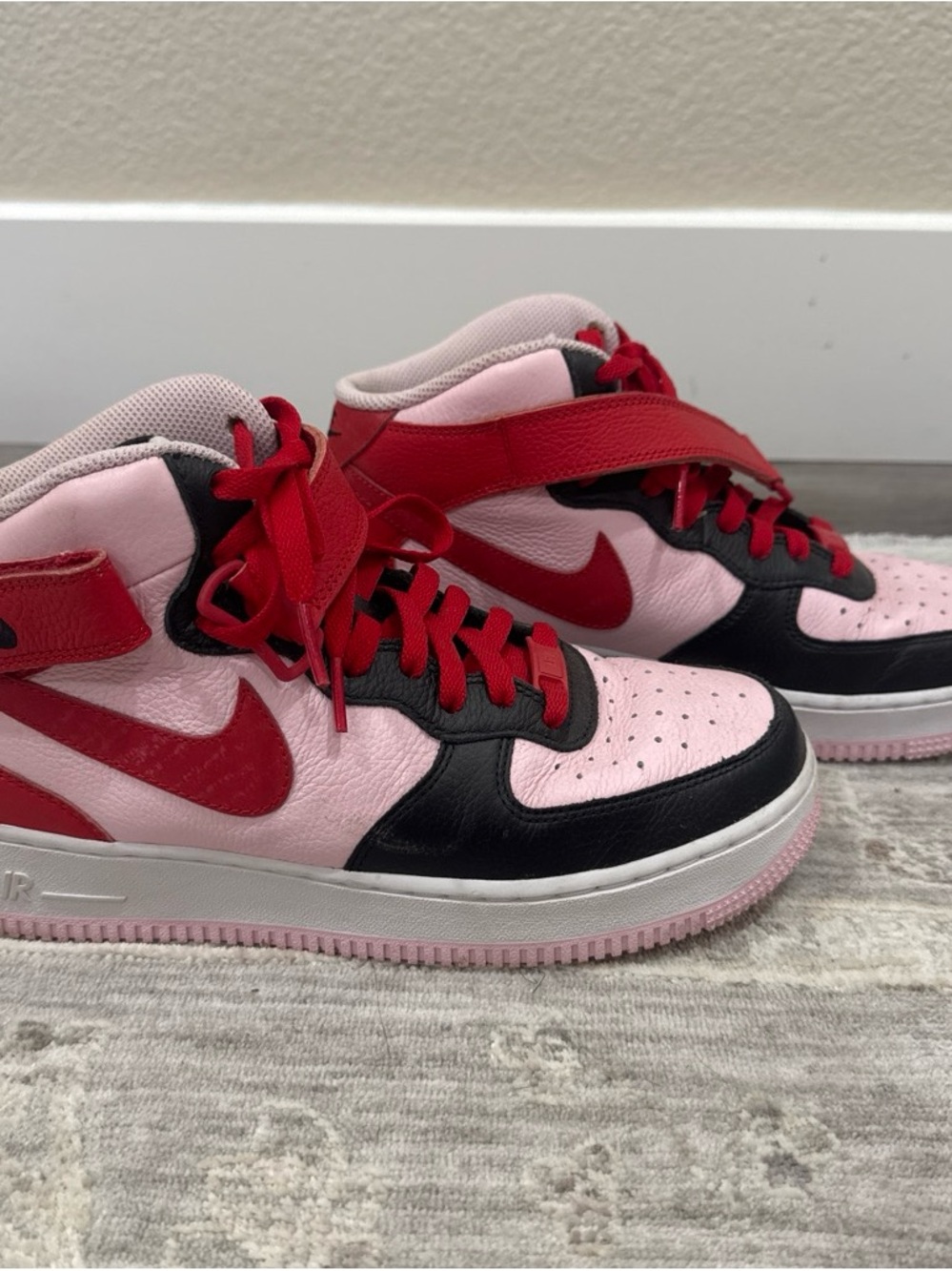 Nike Air Force 1 Pink and Red Black-Accented High-Top Sneakers